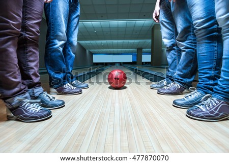 People near bowling ball