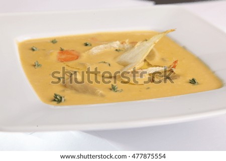 Cream soup with fennel on plate
