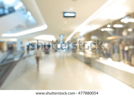 Abstract shopping center interior design in blur background