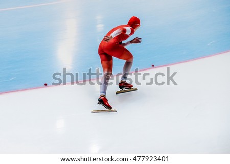 girl skater fast race during a competition in speed skating