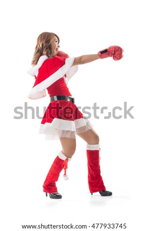 Christmas lady fighting, full length portrait isolated on white.