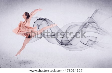 Modern ballet dancer performing with abstract swirl concept on background