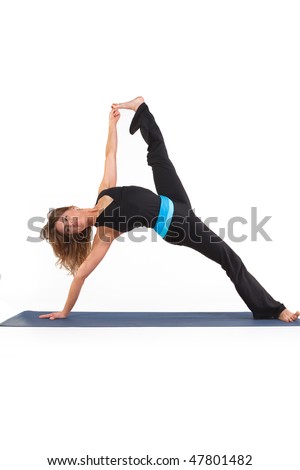 Beautiful woman in a yoga pose on a white background.