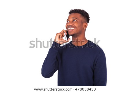 Young African American man making a phone call on her smartphone - Black teenager people