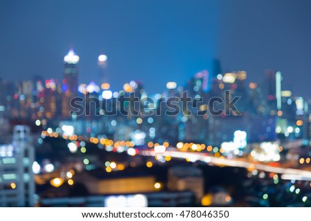 Abstract blurred bokeh lights, twilight city downtown background