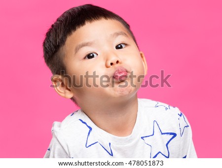 Asian little boy pout his lip