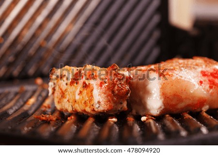 Assorted delicious grilled meat on a barbecue