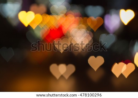 Bokeh Heart Valentine love Vintage. Street Night city  lights Bokeh  varicolored background.
