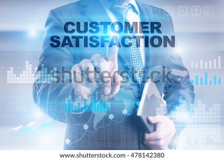 Businessman is pressing button on touch screen interface and selecting "Customer satisfaction".