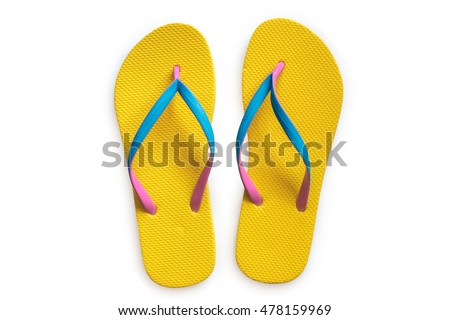 Yellow flip flops isolated on white background. Top view Royalty-Free Stock Photo #478159969