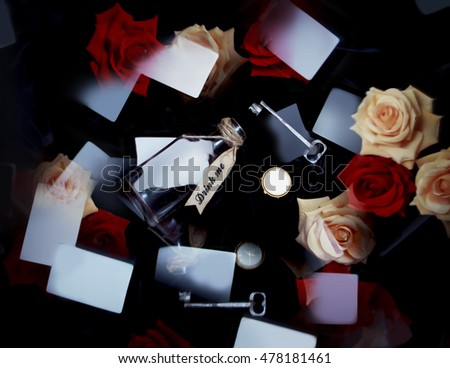 Wonderland playing cards, red and white roses, key, clock, poison. Alice in Wonderland abstract background