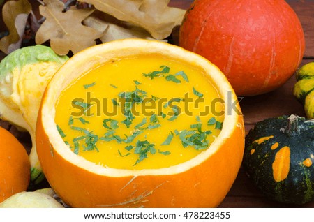 fresh homemade pumpkin soup in pumpkin