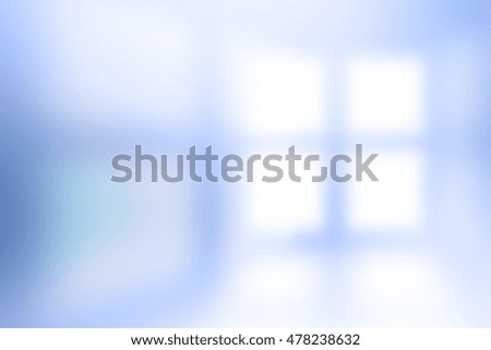 Blurred Lights from windows to room filtered blue color tones.