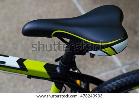 Bike seat, Bicycle saddle on street background Royalty-Free Stock Photo #478243933