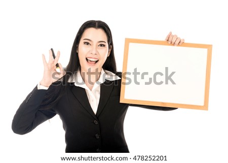 businesswomen holding a blank sign