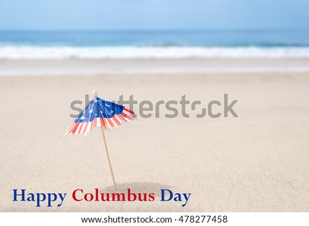 Columbus Day background with starfishes and decorations on the sandy beach
