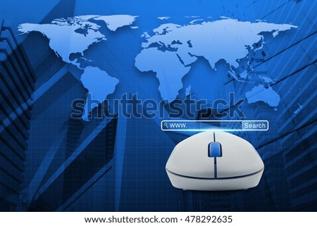 Wireless computer mouse with search www button over map and city tower, Searching system and internet concept, Elements of this image furnished by NASA