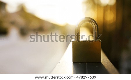 padlock during at sunset.safety or security concept