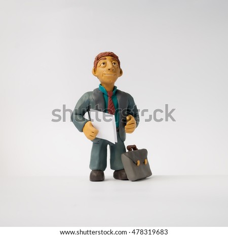
Photos for your design . Made of plasticine funny man in a suit . Businessman cartoon style Royalty-Free Stock Photo #478319683