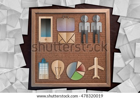 business startup instance tools kits with paper cut flat on corkboard / bulletin board with a wooden frame on leather background