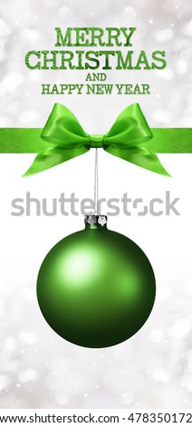 merry christmas and happy new year text with green ball and ribbon bow
