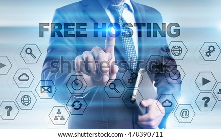 Businessman is pressing button on touch screen interface and selecting "Free hosting".