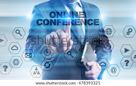Businessman is pressing button on touch screen interface and selecting "Online conference".