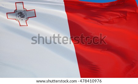 Malta flag waving against clean blue sky, close up, isolated with clipping path mask alpha channel transparency