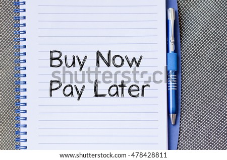 Buy now pay later text concept write on notebook