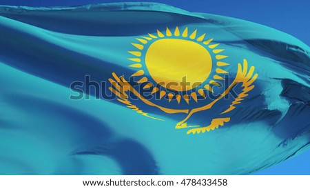 Kazakhstan flag waving against clean blue sky, close up, isolated with clipping path mask alpha channel transparency
