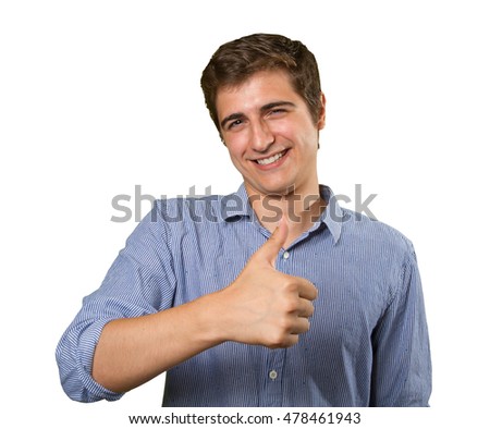 Close up of a satisfied young man with okay gesture on white background