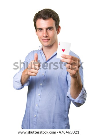 Winner young man holding an ace of hearts on white background