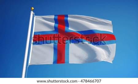 Faroe Islands flag waving against clean blue sky, close up, isolated with clipping path mask alpha channel transparency digital composition