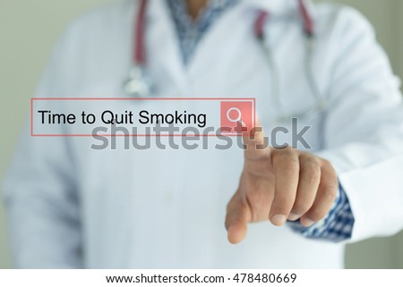 DOCTOR WORKING MODERN INTERFACE TOUCHSCREEN SEARCHING AND TIME TO QUIT SMOKING  CONCEPT
