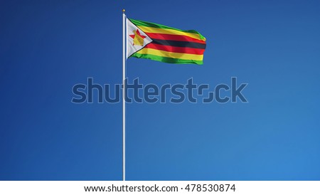 Zimbabwe flag waving against clean blue sky, long shot, isolated with clipping path mask alpha channel transparency