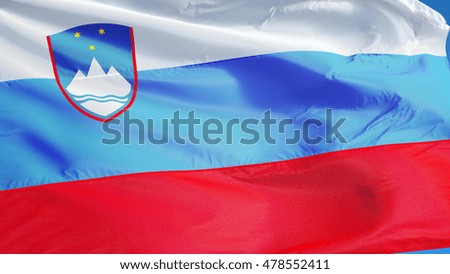 Slovenia flag waving against clean blue sky, close up, isolated with clipping path mask alpha channel transparency