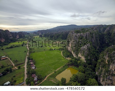 Aerial view of limestone mountain Karst, the Avatar-like mountain pass of sharp cliffs, peak forest and sinkhole landscape at Noen Maprang district of Phitsanulok Province, northern Thailand.