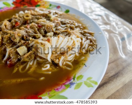 Thai vermicelli eaten with curry, Thai Food, rice vermicelli in rural restaurent