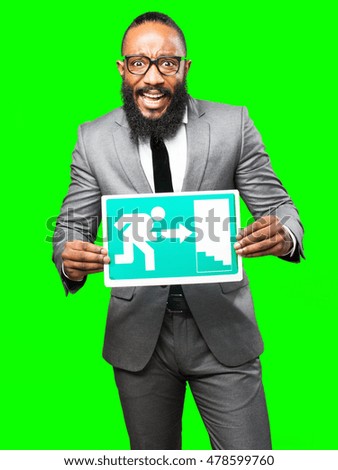 business black man holding an exit banner