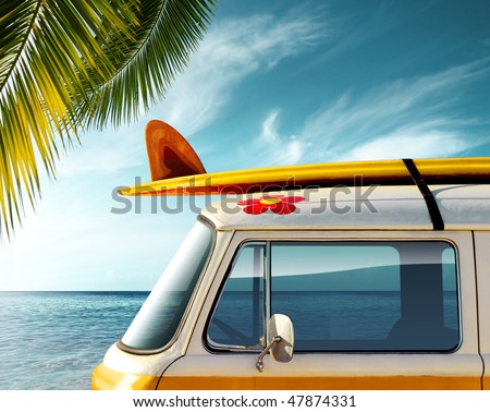 Detail of a vintage van in the beach with a surfboard on the roof Royalty-Free Stock Photo #47874331