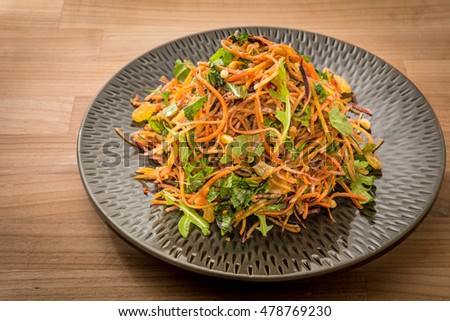 vegan vegetarian salad carrot beetroot rocket raisin organic portion main course diet lunch dinner healthy lifestyle herbs 