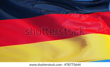 Germany flag waving against clean blue sky, close up, isolated with clipping path mask alpha channel transparency