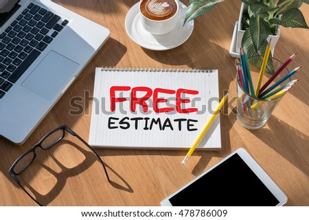 FREE ESTIMATE open book on table and coffee Business