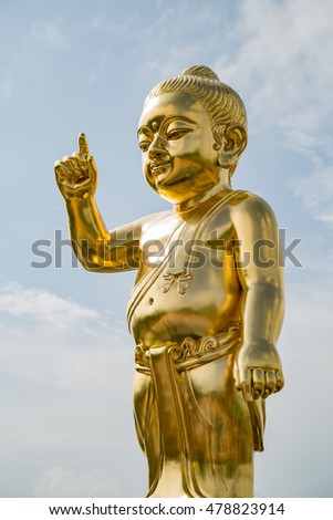 The important baby Buddha gold statue and the most Buddhist pilgrimage site at Lumbini zone, Nepal (birthplace of Lord Buddha)