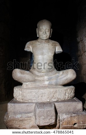  old Stone statues Cambodia in dark background with space for message adapted of Ancient art Template