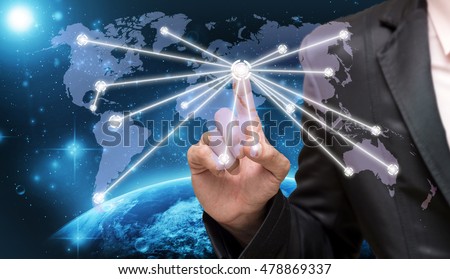 Businessman touching the center point of connection line of global network on world map with Part of earth network line background, business connection concept,Elements of this image furnished by NASA