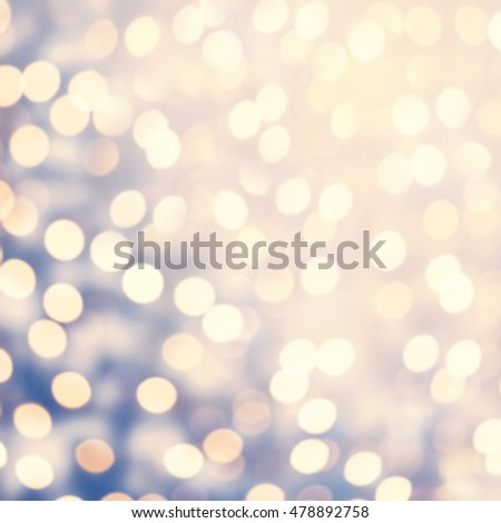 Abstract bright blur sparkle and  glittering shine bubble lights background. Blurry sparkle glitter concept. Defocused banner template design festival backdrop with shining bokeh