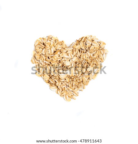 oat flakes in a shape of heart Royalty-Free Stock Photo #478911643