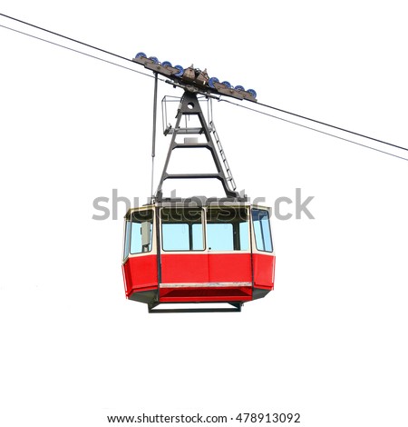 Red cable car isolated on white background. Retro technology and transportation theme. Object with clipping path. Royalty-Free Stock Photo #478913092