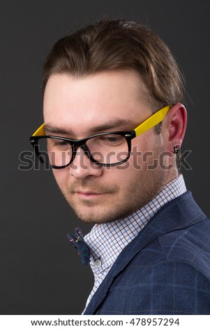 Portrait of a young attractive guy, studio picture